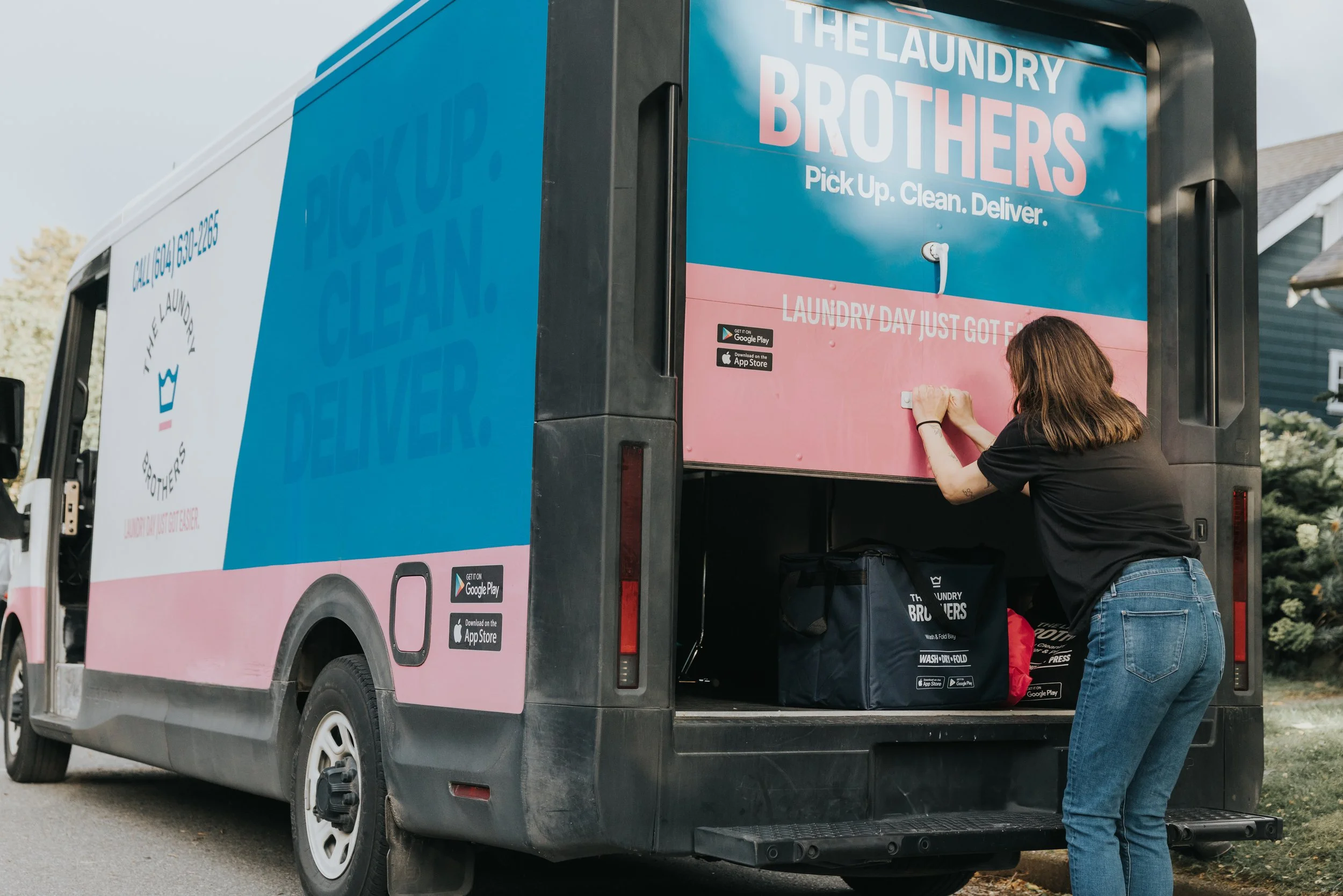 The Laundry Brothers van and specialty laundry bags ready for pickup in Vancouver
